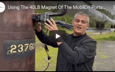 Using The 40LB Magnet Of The MobilDri Portable Dryer On The Alaska Pipeline
